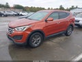 2014 Hyundai Santa Fe — photo 2 of 11 | VIN 5XYZT3LB7EG216815