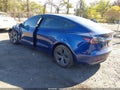2023 Tesla Model 3 — photo 3 of 15 | VIN 5YJ3E1EA9PF665190