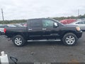 2013 Nissan Titan — photo 13 of 16 | VIN 1N6AA0EC8DN312738