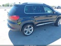 2014 Volkswagen Tiguan — photo 4 of 16 | VIN WVGAV3AX9EW055744