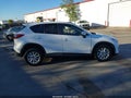 2016 Mazda CX-5 — photo 14 of 17 | VIN JM3KE2CY3G0686592