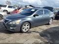 2013 Nissan Altima — photo 2 of 12 | VIN 1N4AL3APXDC266371