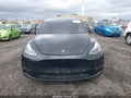 2023 Tesla Model Y — photo 11 of 17 | VIN 7SAYGDEE9PF858835
