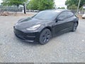 2023 Tesla Model 3 — photo 2 of 19 | VIN 5YJ3E1EB6PF660036