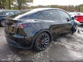 2023 Tesla Model Y — photo 4 of 19 | VIN 7SAYGDEF3PF814158