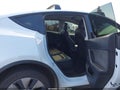 2022 Tesla Model Y — photo 8 of 17 | VIN 7SAYGAEE5NF520411