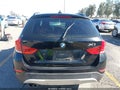 2013 BMW X1 — photo 16 of 16 | VIN WBAVM1C54DVW45750