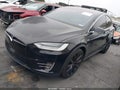 2021 Tesla Model X — photo 2 of 18 | VIN 5YJXCBE46MF322680