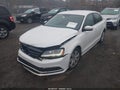 2017 Volkswagen Jetta — photo 2 of 16 | VIN 3VW2B7AJXHM217693