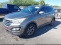 2014 Hyundai Santa Fe — photo 2 of 16 | VIN 5XYZU3LB0EG150105