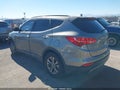 2014 Hyundai Santa Fe — photo 3 of 16 | VIN 5XYZU3LB0EG150105