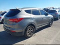 2014 Hyundai Santa Fe — photo 4 of 16 | VIN 5XYZU3LB0EG150105