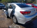 2019 Kia Rio — photo 3 of 15 | VIN 3KPA24AB4KE210715