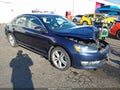 2014 Volkswagen Passat — photo 1 of 16 | VIN 1VWCN7A35EC026158