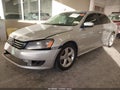 2014 Volkswagen Passat — photo 2 of 19 | VIN 1VWAT7A3XEC051733