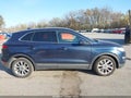 2015 Lincoln MKC — photo 13 of 16 | VIN 5LMCJ2A99FUJ20361
