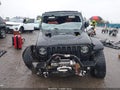 2020 Jeep Wrangler Unlimited — photo 12 of 16 | VIN 1C4HJXDG5LW207002