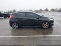 2014 Ford Fiesta — photo 13 of 17 | VIN 3FADP4GX8EM180362