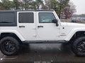 2016 Jeep Wrangler Unlimited — photo 13 of 16 | VIN 1C4HJWEG9GL152019