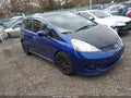 2009 Honda Fit — photo 1 of 12 | VIN JHMGE88409S039838