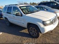 2004 Jeep Grand Cherokee — photo 1 of 11 | VIN 1J8GW58NX4C118158
