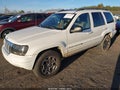 2004 Jeep Grand Cherokee — photo 2 of 11 | VIN 1J8GW58NX4C118158