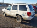 2004 Jeep Grand Cherokee — photo 3 of 11 | VIN 1J8GW58NX4C118158