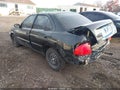 2004 Nissan Sentra — photo 3 of 11 | VIN 3N1CB51D14L480423