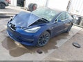 2019 Tesla Model 3 — photo 2 of 17 | VIN 5YJ3E1EA7KF309197