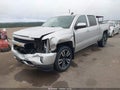 2018 Chevrolet Silverado 1500 — photo 2 of 16 | VIN 3GCUKREC1JG162221