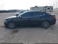 2015 Acura TLX — photo 14 of 16 | VIN 19UUB2F57FA019823