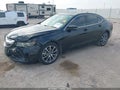 2015 Acura TLX — photo 2 of 16 | VIN 19UUB2F57FA019823