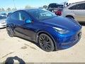 2022 Tesla Model Y — photo 1 of 18 | VIN 7SAYGDEF2NF330172