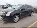 2014 Cadillac SRX — photo 2 of 17 | VIN 3GYFNEE39ES687193