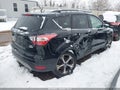 2018 Ford Escape — photo 4 of 17 | VIN 1FMCU0HD2JUA01942
