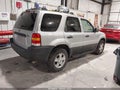 2003 Ford Escape — photo 4 of 11 | VIN 1FMYU93183KA79017