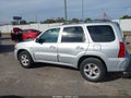 2006 Mazda Tribute — photo 14 of 16 | VIN 4F2CZ06186KM37499