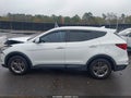 2017 Hyundai Santa Fe — photo 14 of 16 | VIN 5XYZT3LB5HG414376