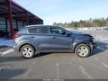 2017 Kia Sportage — photo 13 of 17 | VIN KNDPMCAC9H7034762