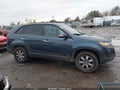 2011 Kia Sorento — photo 13 of 16 | VIN 5XYKTCA15BG015812