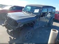 2022 Jeep Wrangler Unlimited — photo 2 of 18 | VIN 1C4HJXDG9NW183063