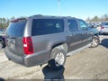 2013 Chevrolet Suburban 1500 — photo 4 of 16 | VIN 1GNSKJE79DR129622