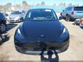 2023 Tesla Model Y — photo 13 of 19 | VIN 7SAYGDED3PF948392