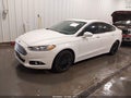 2014 Ford Fusion — photo 2 of 16 | VIN 1FA6P0HD0E5386884
