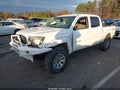 2014 Toyota Tacoma — photo 2 of 17 | VIN 5TFLU4EN5EX107301
