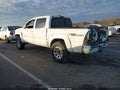 2014 Toyota Tacoma — photo 3 of 17 | VIN 5TFLU4EN5EX107301