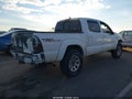 2014 Toyota Tacoma — photo 4 of 17 | VIN 5TFLU4EN5EX107301