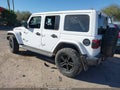 2022 Jeep Wrangler Unlimited — photo 3 of 16 | VIN 1C4HJXEG3NW102752