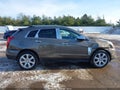 2014 Cadillac SRX — photo 13 of 16 | VIN 3GYFNCE30ES567111
