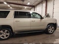 2016 Chevrolet Suburban — photo 14 of 17 | VIN 1GNSKHKC7GR126135